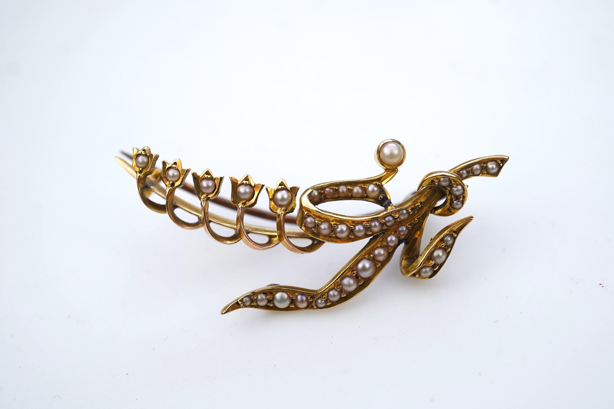 An Edwardian gold and seed pearl brooch, early 20th century